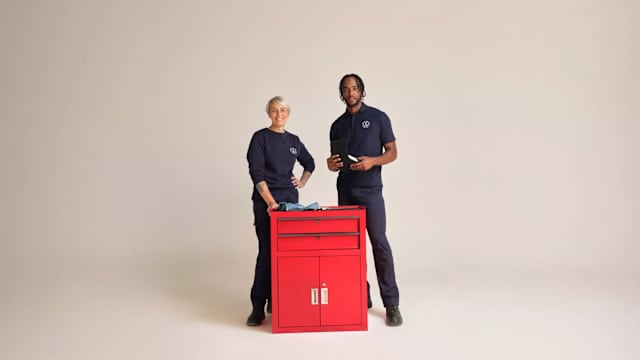 Volkswagen service team beside a red tool cabinet – servicing and parts at Camerons Volkswagen, Perth
