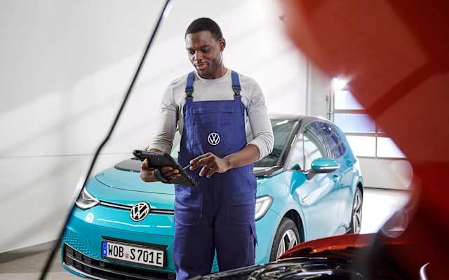 Volkswagen technician diagnosing an ID. Buzz – electric vehicle care at Camerons Volkswagen, Perth