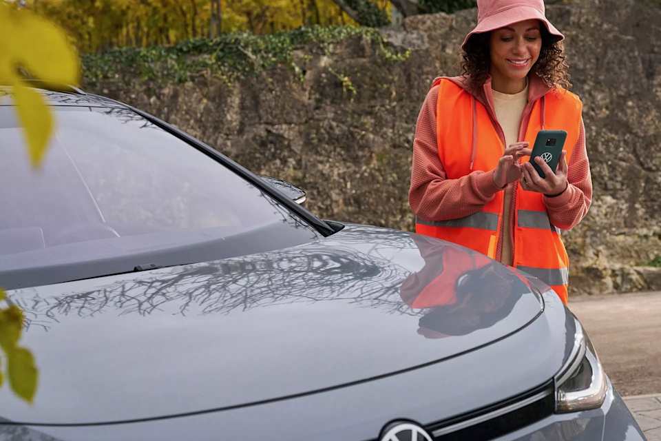 Driver requesting roadside assistance from their phone – Camerons Volkswagen, Perth