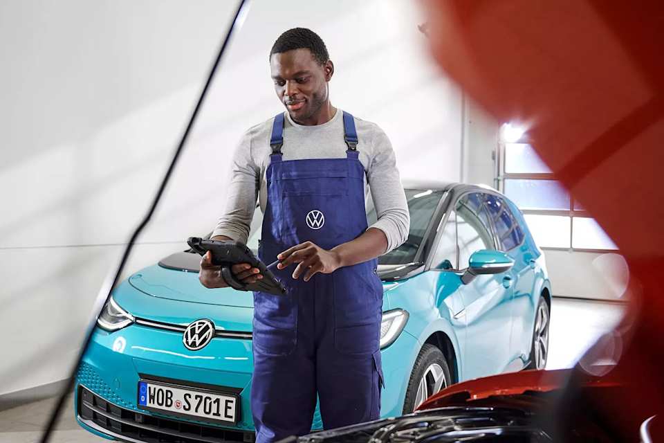 Volkswagen technician diagnosing an ID. Buzz – electric vehicle care at Camerons Volkswagen, Perth
