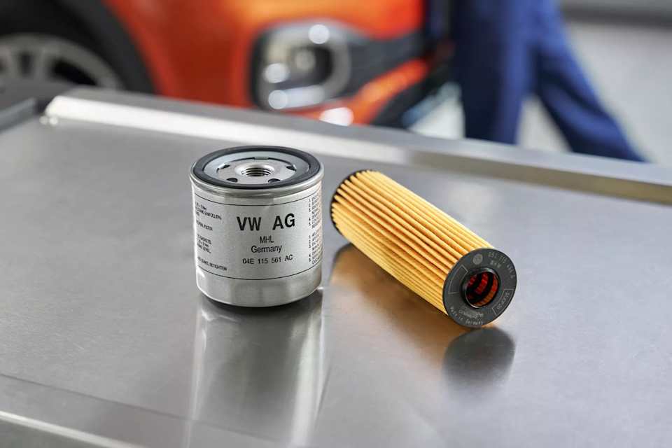 Volkswagen Genuine oil filter and filter insert with a T-Cross behind – genuine parts at Camerons Volkswagen, Perth